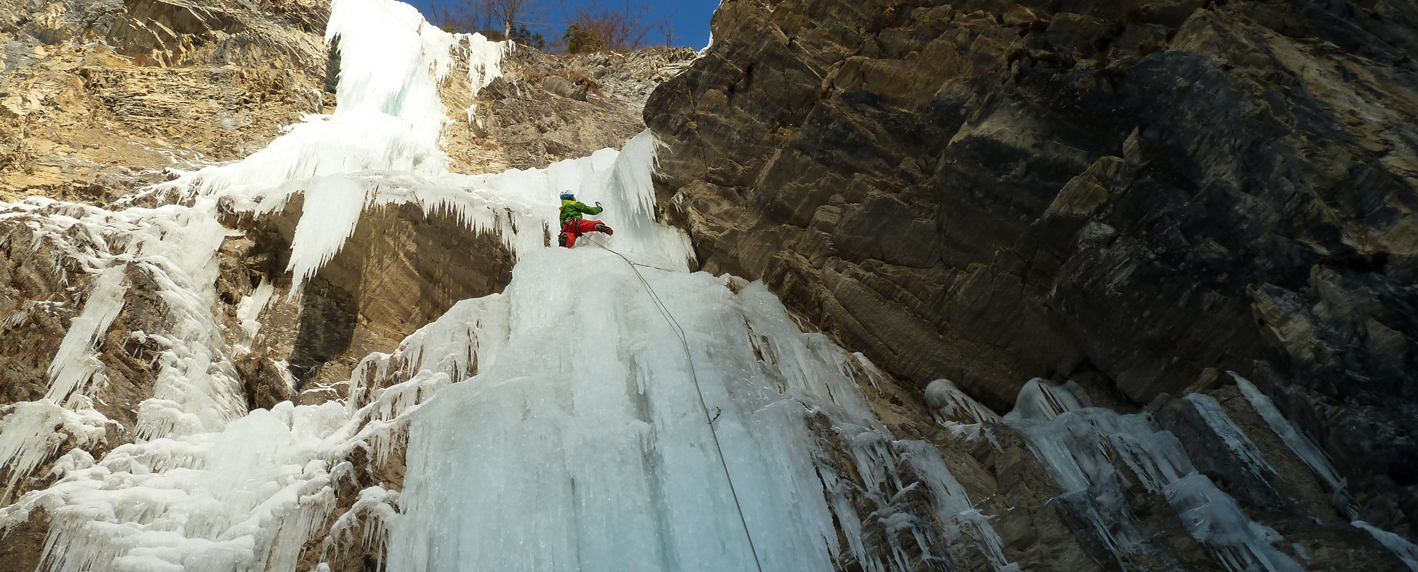 Ice climbing on icy waterfalls in Gastein valley.